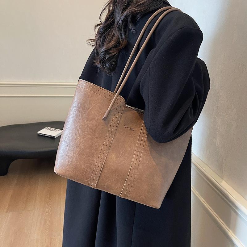 Premium sense retro large-capacity bag women's 2025 new fashion commuter bag shoulder bag popular tote bag