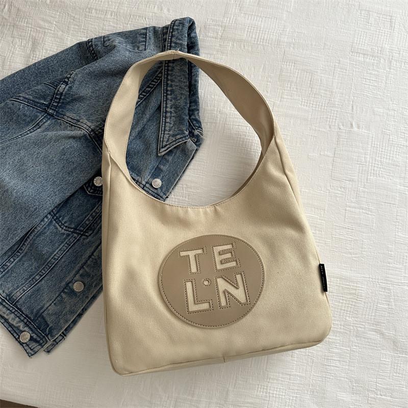 

Stylish Large Capacity Spring Season Gorgeous Canvas Tote Bag For Women Ideal For Daily Commuting And Classes хакі