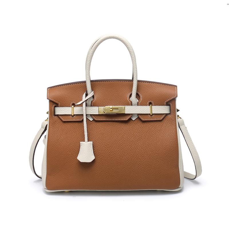 2021 Spring new trendy leather handbag top layer cowhide capacity one-shoulder crossbody hand-carried platinum bag