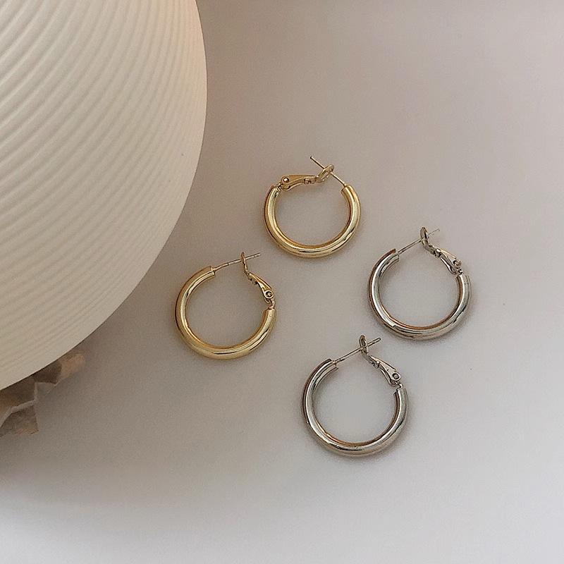 

Trendy 2023 Gold Circle Hoop Earrings - French European Niche Stud Design for Women