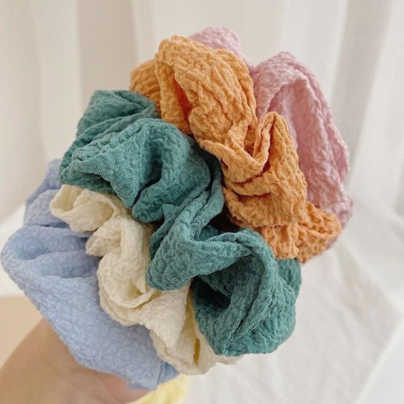 Женский аксессуар для волос: хвост, косичка, заколка для волос пастельного цвета