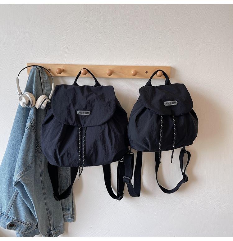 Contrasting color cloth backpack, women's 2025 summer new student commuting lazy style fashion versatile handbag