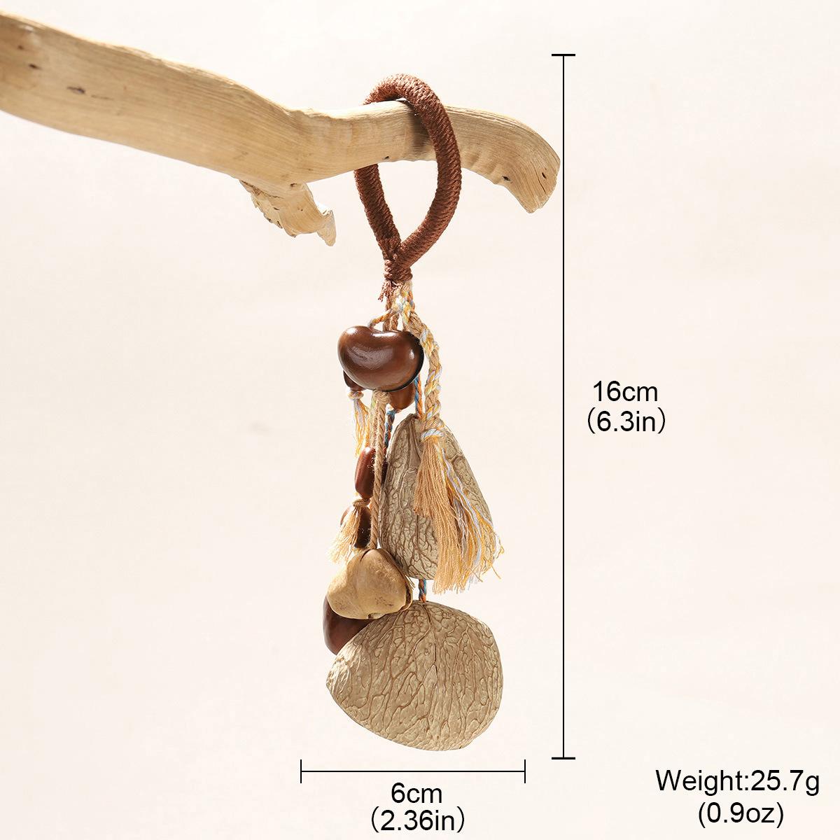 

Natural shell wind chime pendant, fringed long handmade seeds, hand-rang bells, Bodhi wish, fruit shell retro pendant.