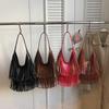 Large-capacity commuter fringed bag women's 2026 spring new retro go out hand carry shoulder armpit bag