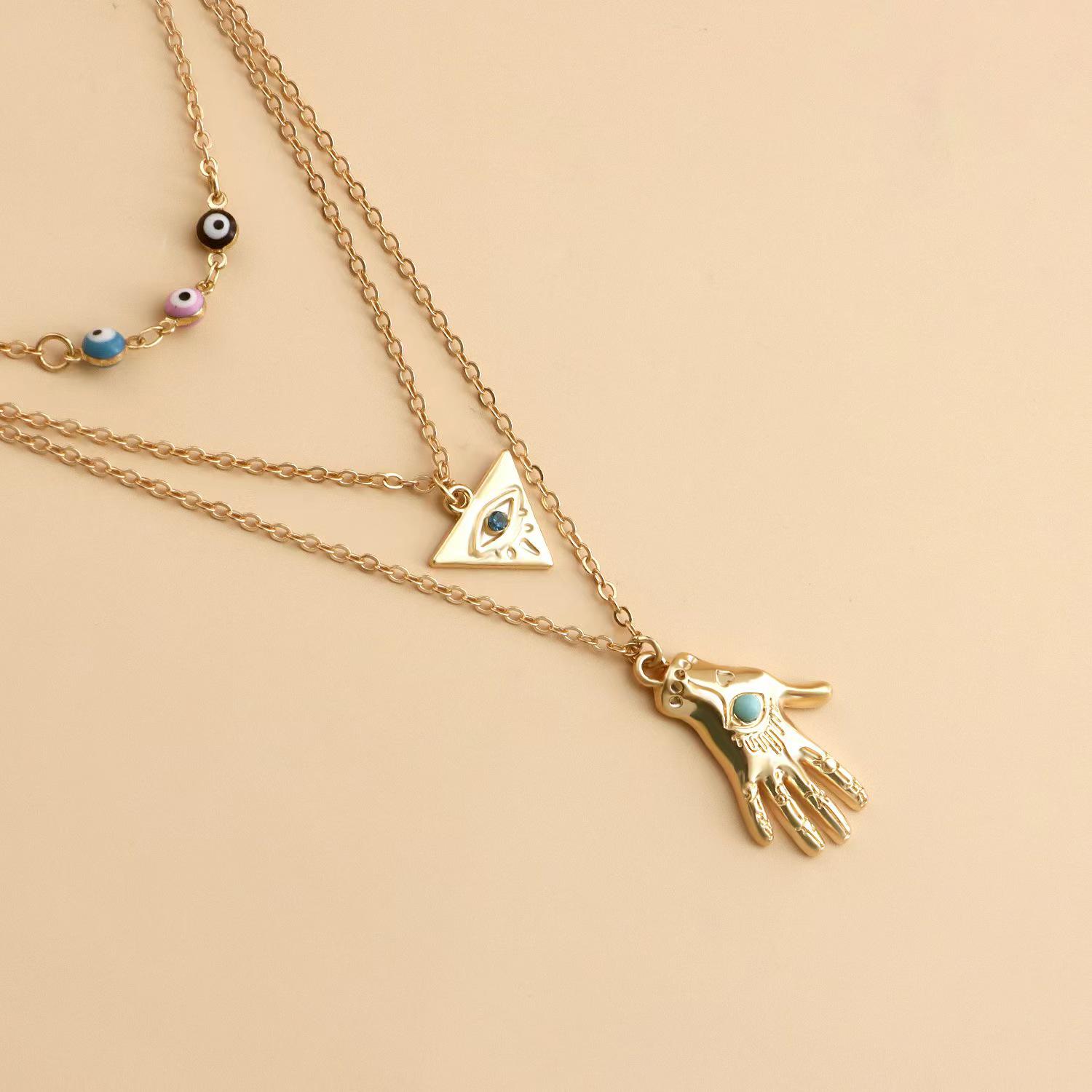 

Винтажное ожерелье в стиле легкой роскоши с многослойным кулоном «Глаз дьявола» для женщин Electroplated Real Gold