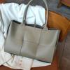 Foreign trade cross-border cowhide woven tote bag genuine leather 2026 new portable large bag shoulder bag large capacity armpit bag