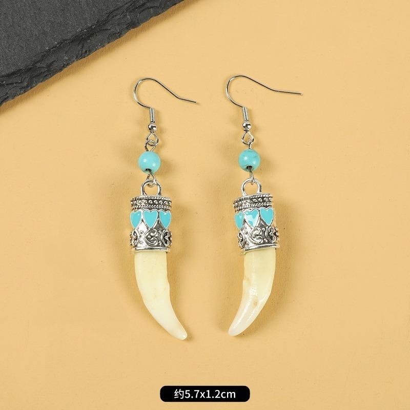 Tibetan wolf tooth earrings Tibetan silver inlaid real Tibetan mastiff dog tooth personality temperament niche earrings Tibetan earrings