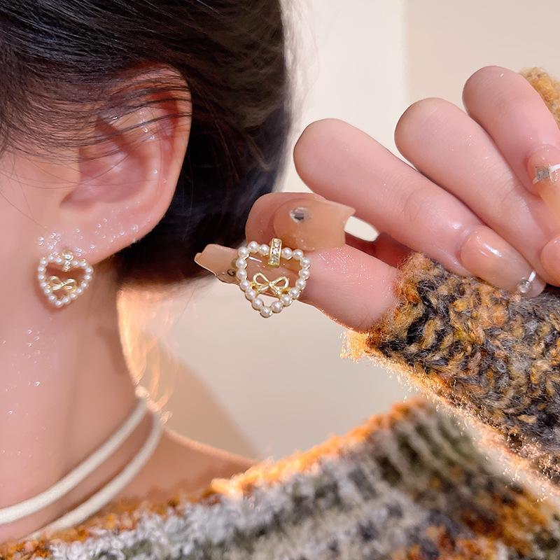 Korean Sweet Bow Pearl Earrings: Luxury Niche Design for Women