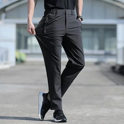 Letní pánské chladivé kalhoty Módní ležérní volné strečové rychleschnoucí tenké sportovní joggery pro muže plus size teplákové kalhoty
