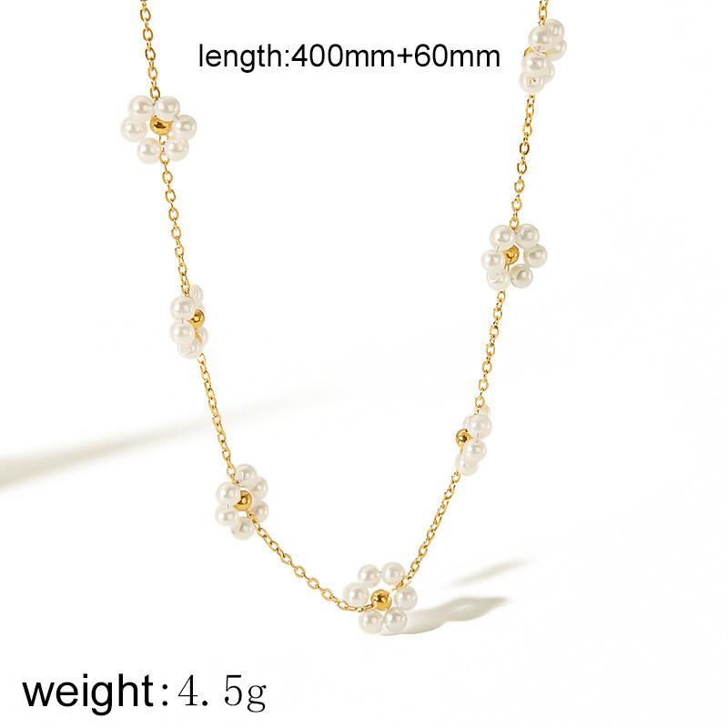 Herzmuschel-Halskette für Damen mit vergoldetem Blumendesign und Perlenanhänger