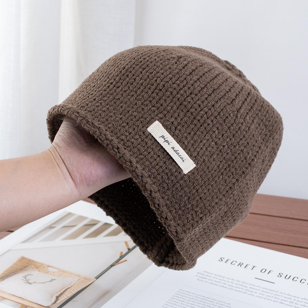 Simple solid color knitted bag head stacking hat women's early autumn new plain and versatile big head circumference showing face small wool hat