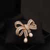 European and American light luxury bow bead pendant brooch new fashion accessories women's suit coat exquisite temperament pin
