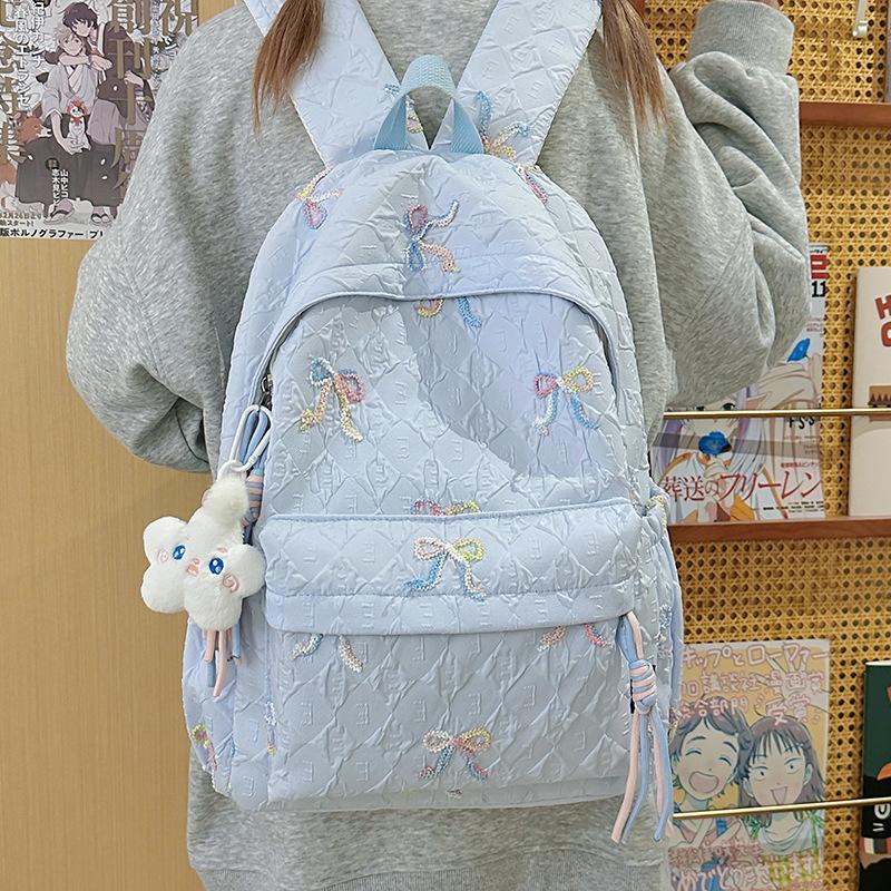 Japanese bow schoolbag for female junior high school students, cute versatile large-capacity backpack, high-value student backpack tide