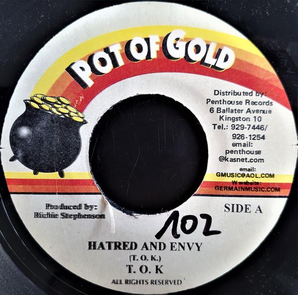 

7inch Record T.O.K. - Hatred And Envy NONE Pot Of Gold Jamaica Reggae, Ska & Dub Used