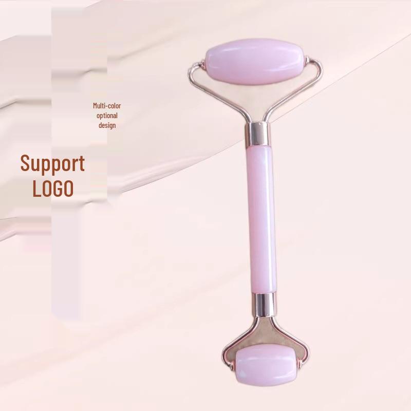 Heart-Shaped Rose Quartz Facial Roller & Gua Sha Massager for Skin Lifting and Muscle Relaxation.