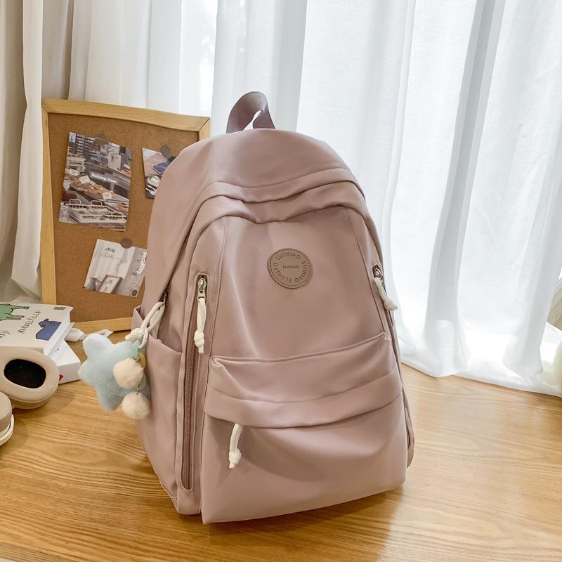 Einfacher einfarbiger leichter Rucksack Mädchen Joker Junior High School Alle Rucksäcke Shopping-Rucksack.