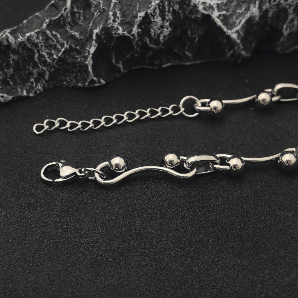 2025 European & American Stylish Layered Jewelry Set: Interlocking Chunky Chain Necklace & Bracelet with Titanium Steel Bead Chain.