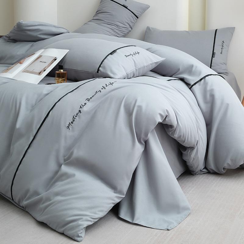 2025 new solid color embroidered ribbon double-spell skin-friendly washed cotton 4-piece set bed sheet and fitted sheet style