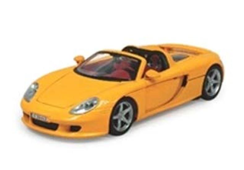 

Cararama Porsche Carrera GT Желтый масштаб 125066 1/24