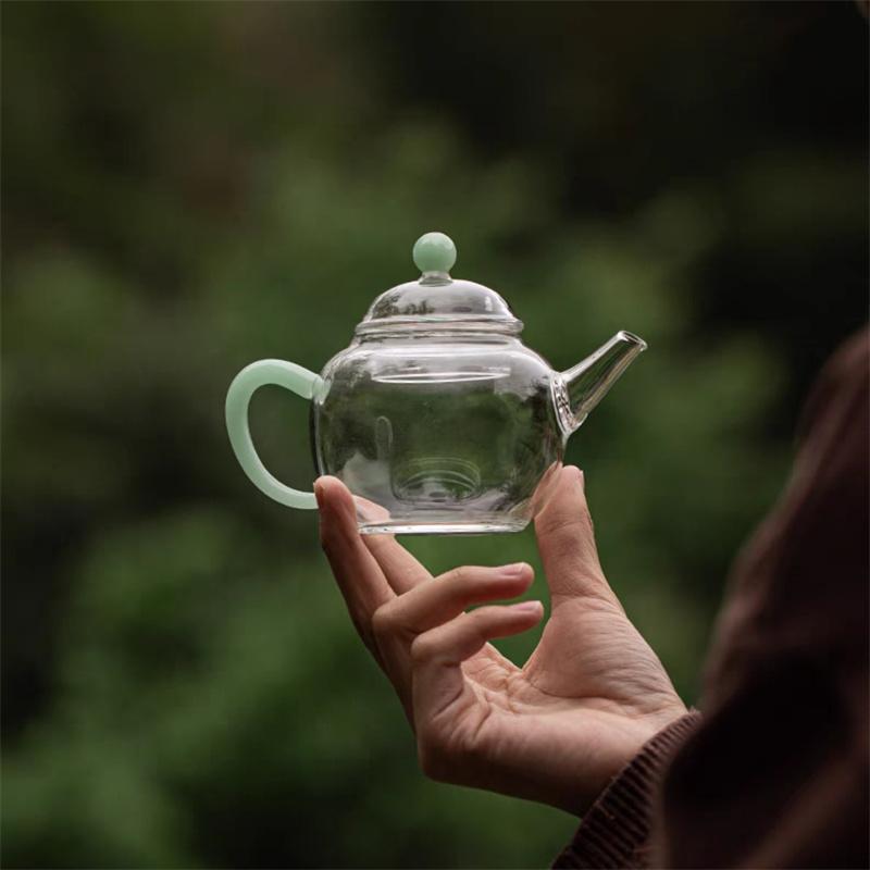 

Маленький термостойкий стеклянный чайник 200 мл с ручкой под нефрит, с ситечком, для чайной церемонии Кунг-фу, чайная посуда светло-зеленый