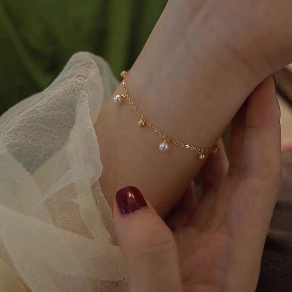 Classic and versatile natural pearl gold-plated starburst design14K Gold-plated bracelet, versatile and chic, perfect for women with a refined taste