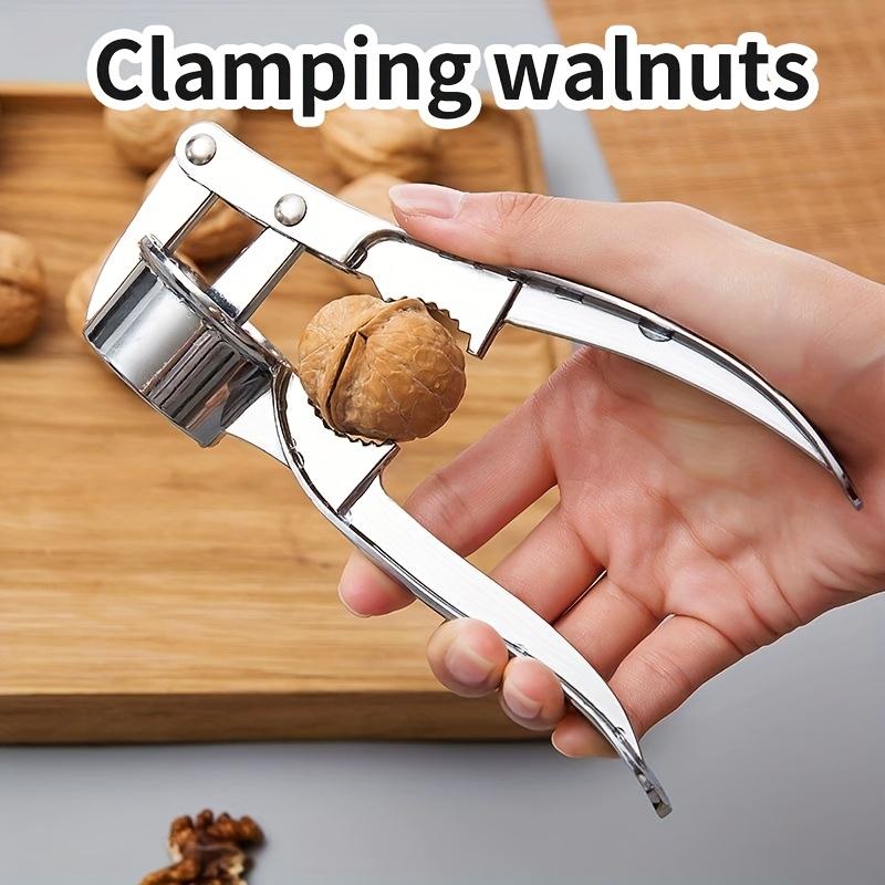 Durable 2-in-1 garlic press and nutcracker - High-Quality Manual Garlic Press Easily chops and peels Very suitable for home cooking Essential