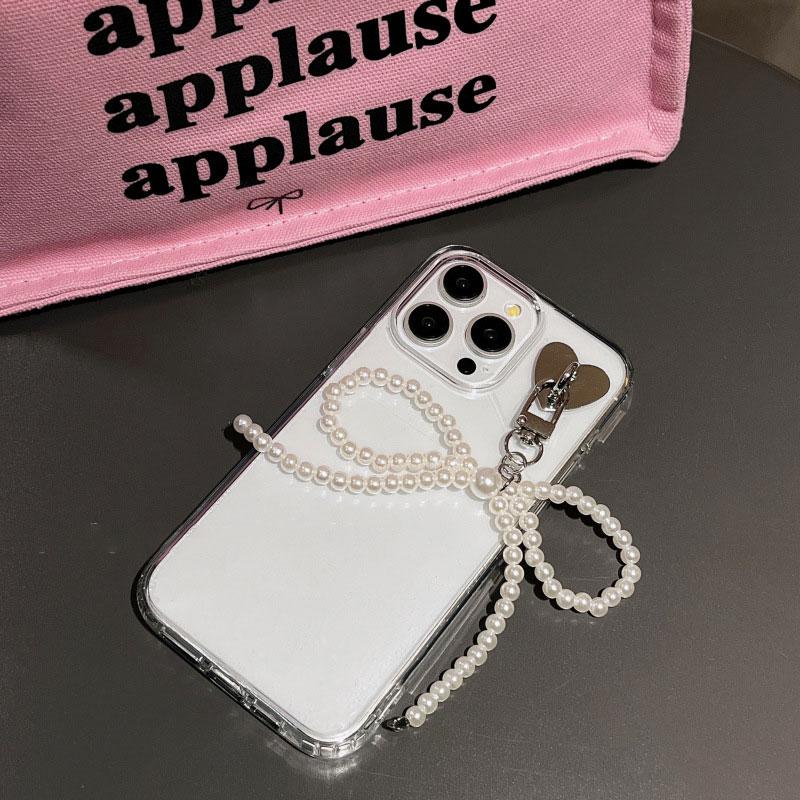 

Подвеска для мобильного телефона AirPods, брелок в форме сердца, подвеска с жемчужным бантом, элегантная подвеска с жемчужным бантом для телефона