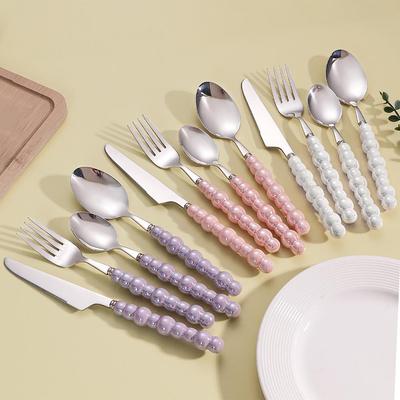 Elegantes 304 Edelstahl Besteckset: Messer, Gabel & Löffel mit kreativen Perlen-Keramikgriffen. Perfekt für Western Steak & Dessert.