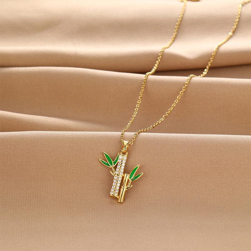 

Полностью бриллиантовое бамбуковое ожерелье Женское Свежее Ретро Универсальное Темперамент Подвеска в виде зеленого листа Уличная съемка Те же украшения