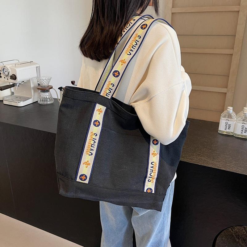 Canvas Bag Women's Large Capacity Simple 2025 New Casual Fashion Shoulder Bag for Commuting Tote Travel Bag