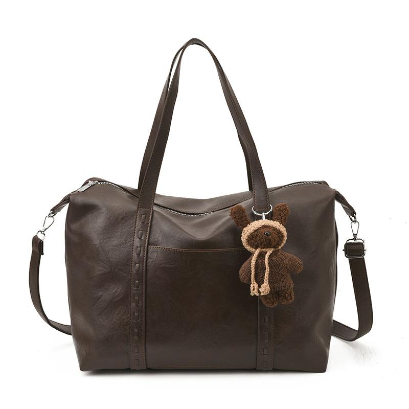 

Large-capacity commuter tote bag women s 2025 new high-end shoulder messenger bag casual handbag tide no pendant