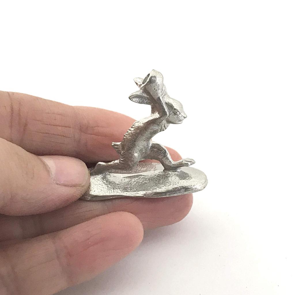A miniature tin rabbit from the Choju Jinbutsu Giga perfect for your dry landscape painting, garden.