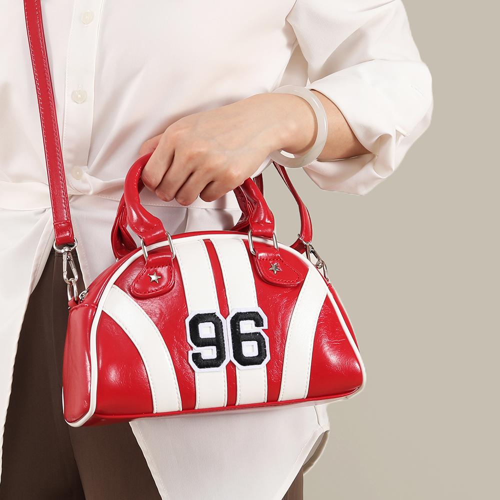 Red hard and three-dimensional striped tote bag with a sense of luxury, suitable for crossbody or hand-held use.