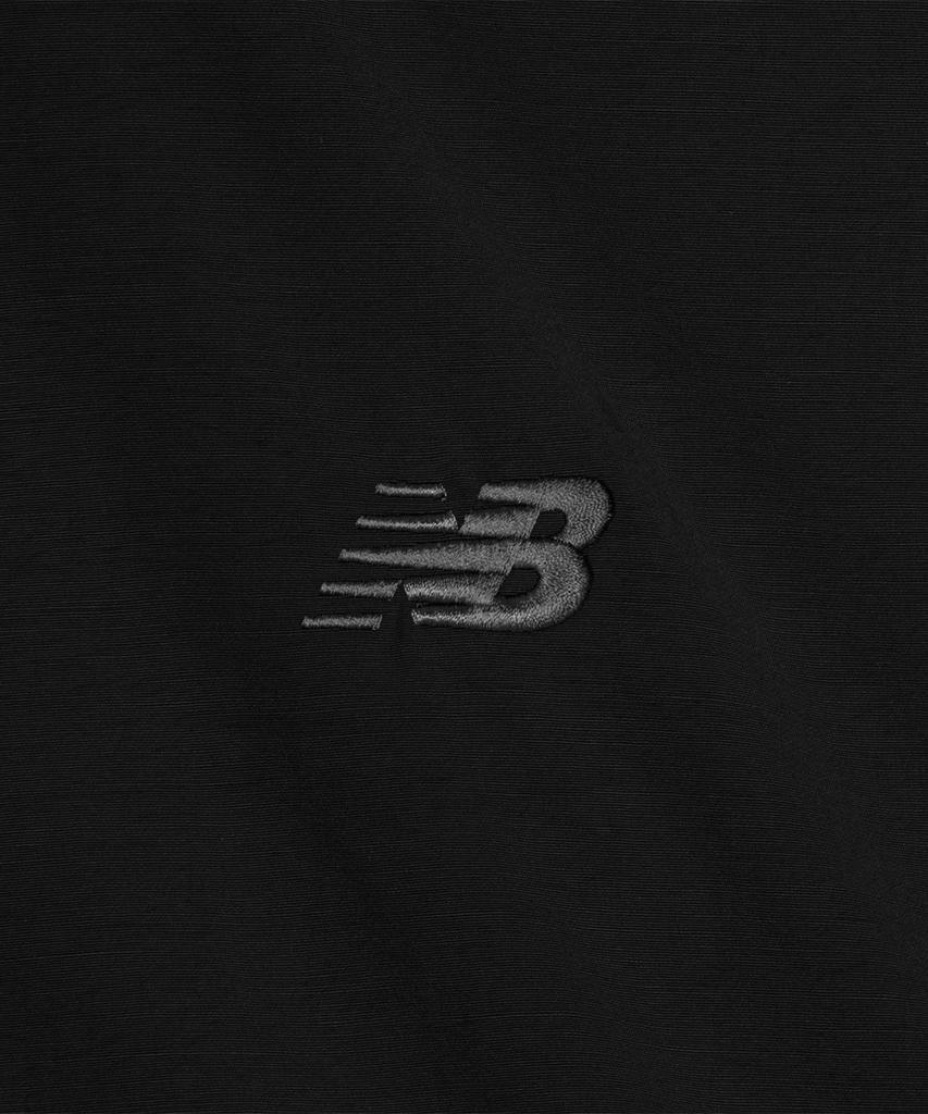 New Balance Nbnag31803 / Uni Essential Heritage Opstaande Kraag Opwarmjack (Zwart)