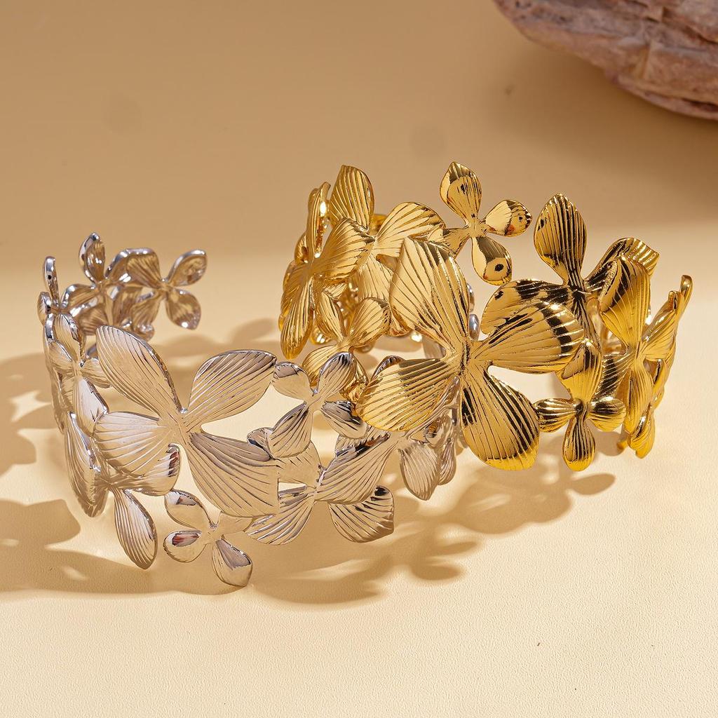 Edelstahl Armreif mit Ausstanzungen in Blumenform, Europäische & Amerikanische Mode, High-End Armband aus Titanstahl.
