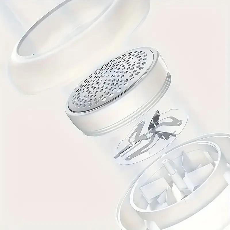 Un Scămoșator Portabil pentru Uz Casnic, cu Operare Manuală și Încărcare USB cu o Baterie Litiu Încorporată de 500 mAh