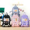 Korean Version of Fashion Trend Casual Large Capacity Foreign Style Versatile Backpack Small Fresh Japanese Four-piece Set Student Schoolbag