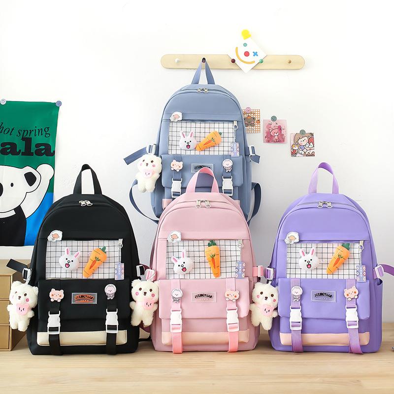 Korean Version of Fashion Trend Casual Large Capacity Foreign Style Versatile Backpack Small Fresh Japanese Four-piece Set Student Schoolbag