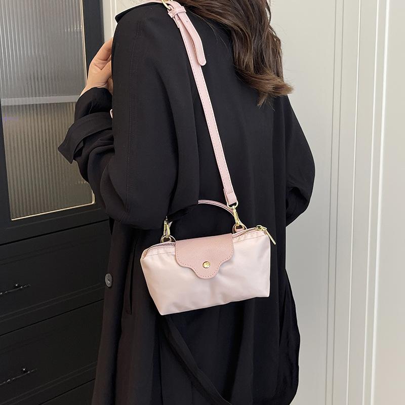 Niche machine bag nylon cloth portable dumpling bag new shoulder crossbody small bag hand change bag tide