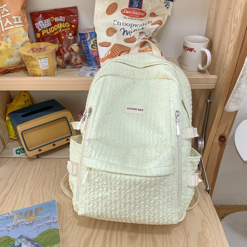 Niche Design Simple Backpack Female College Student Junior High School Girl Japanese Soft Girl Bubble Grid High Value Schoolbag