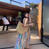 Seaside vacation floral spaghetti strap dress for women, new French vintage bohemian ethnic style, stunning midi skirt