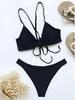 Costume da bagno bikini push-up con dettaglio laccetto, vita alta nera, cut-out. Costume da bagno bikini push-up con dettaglio laccetto, vita alta nera, cut-out.