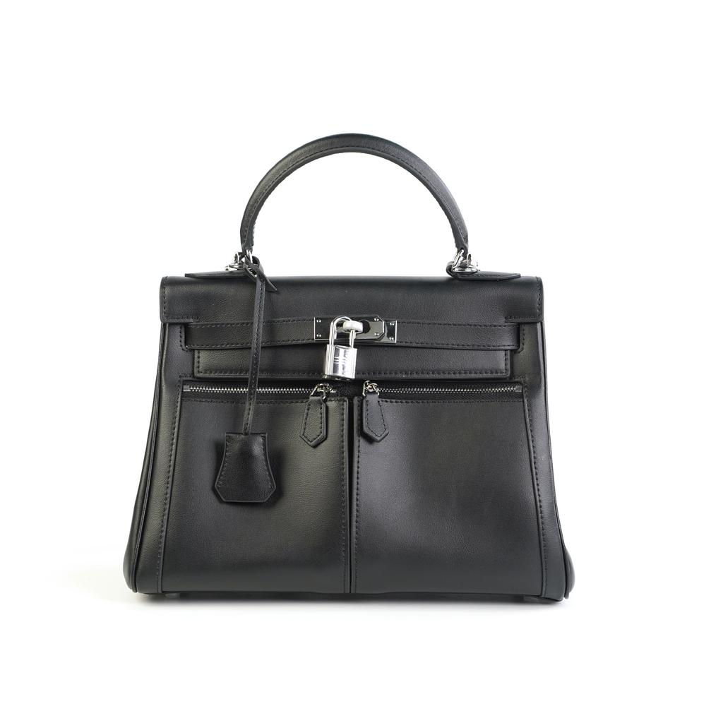 This Women's Bag Is Made of Cowhide with Double Pockets and Has a Large Capacity for Commuting. It Features Two Shoulder Straps and a Shoulder Strap