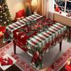 One Christmas tablecloth with red and green checkered pattern for festive dining table decoration, featuring holly and bows.zyc