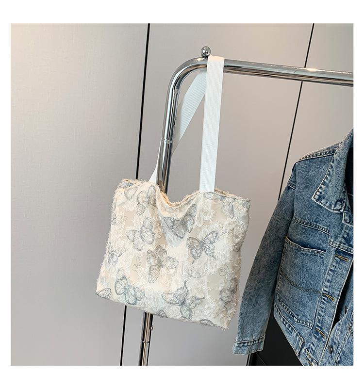 

2024 New Summer Leisure Single Butterfly Embroidery New Chinese Style Beautiful Large Capacity Commuter Shoulder Tote Bag сірий колір