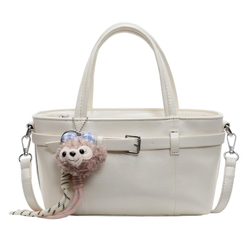 Popular new Korean version of niche casual oil wax leather portable bucket bag fashionable and simple commuter versatile messenger women's bag