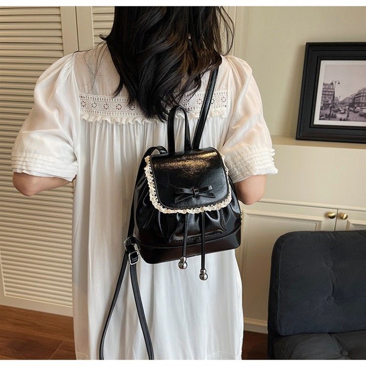 

Gentle wind lace bow niche mini backpack women s new fashion versatile portable travel small backpack чёрный