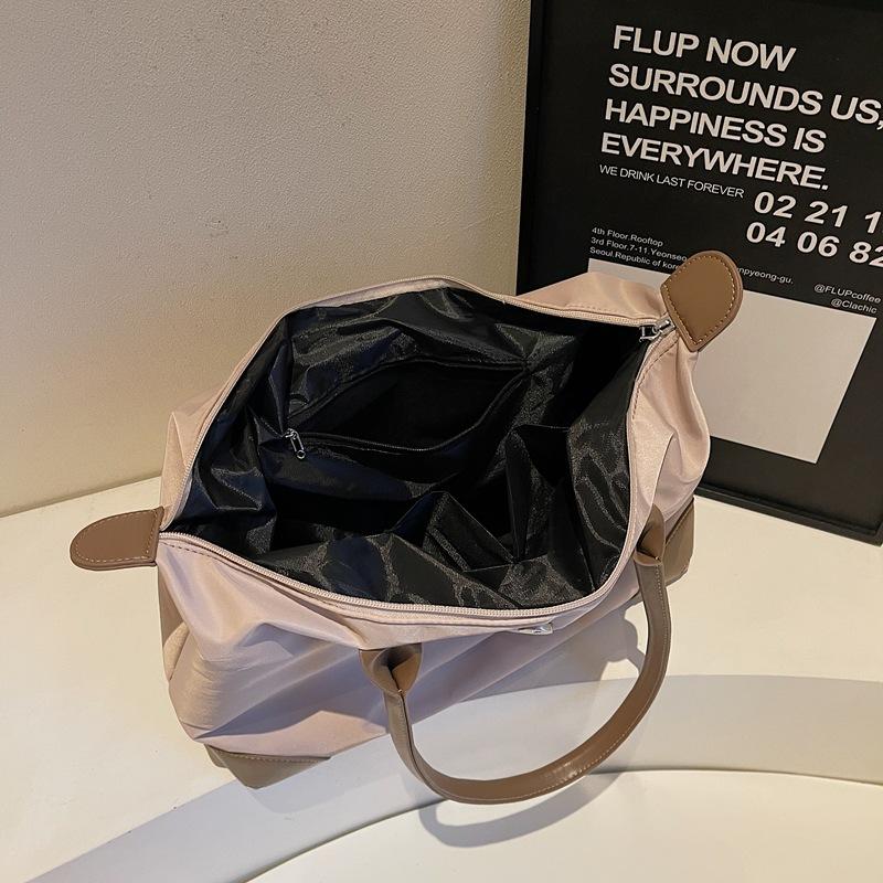 Travel bag, high-end sense, large-capacity anti-splashing dumpling bag, fitness bag, business trip, maternity, accommodation, storage, shoulder bag.