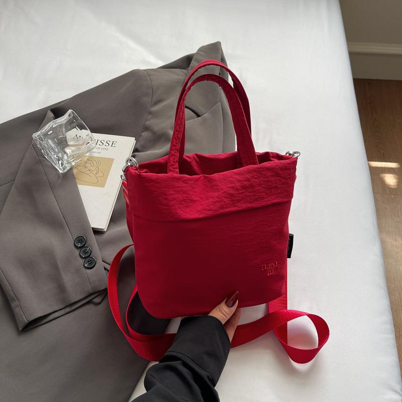 

Mobile phone bag summer cute nylon bag fashionable and simple portable messenger small tote bucket women s bag красный