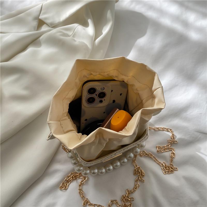 Pearl handbag women's 2025 new trendy small square bag fashion chain shoulder bag summer Internet celebrity woven bucket bag